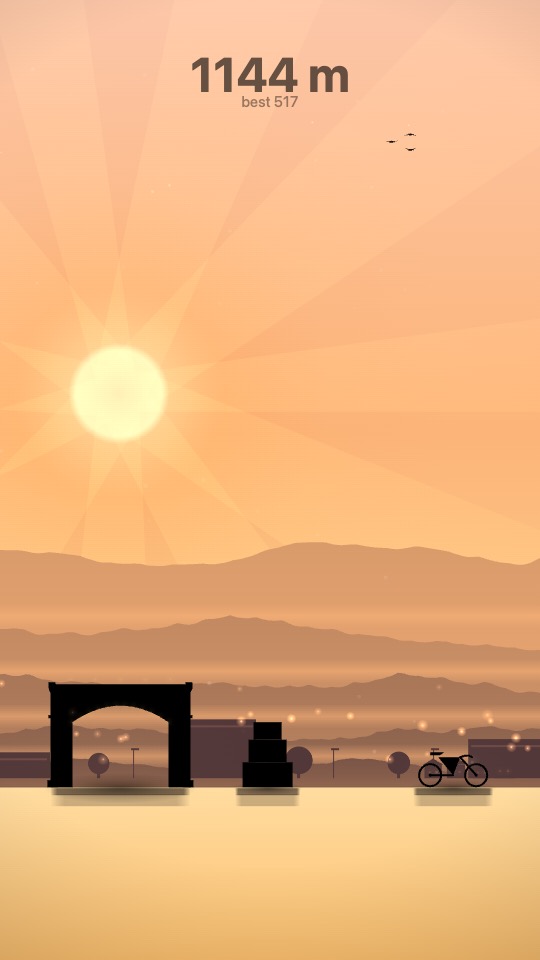 Gameplay: Sunrise, a warm golden sky low over the mountains